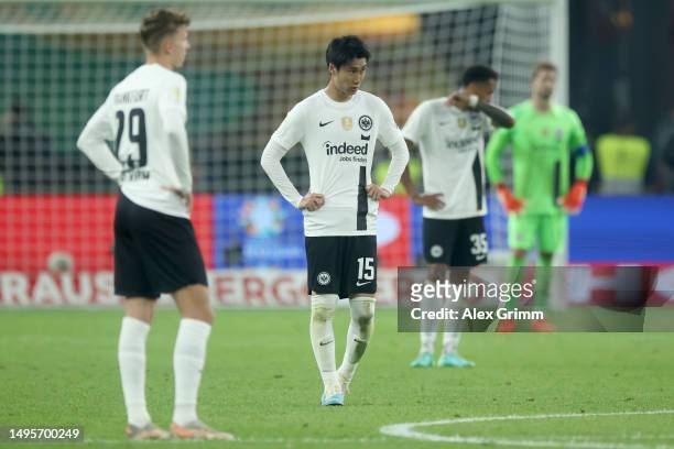 Daichi Kamada of Eintracht Frankfurt looks dejected during the DFB Cup final match between RB Leipzig and Eintracht Frankfurt at Olympiastadion on...