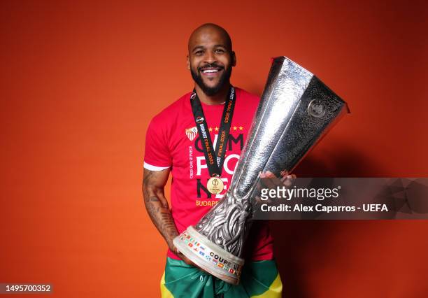 Marcao of Sevilla FC poses for a photo with the UEFA Europa League trophy after Sevilla FC's victory in the UEFA Europa League 2022/23 final match...