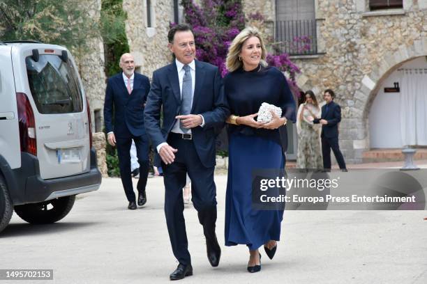 Matias Prats and Ruth Izcue are seen arriving to the church for Prats' son's wedding on June 3, 2023 in Sant Marti d'Empuries, Catalonia, Spain.