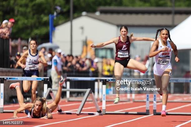 Natalia Sawyer of Buffalo State Bengals competes in the womens 400 meter hurdles during the Division III Mens and Womens Outdoor Track & Field...