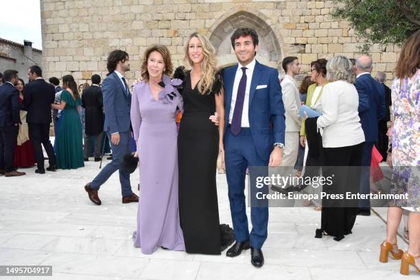 Maite Chacon, her daughter, Marta Prats, and her partner Alberto Salas are seen leaving the church after the wedding on June 3, 2023 in Sant Marti...