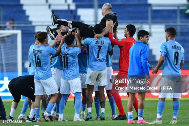 Players of Israel celebrate with Head coach of Israel Ofir Haim following the team's victory in the FIFA U-20 World Cup Argentina 2023 Quarter Finals...