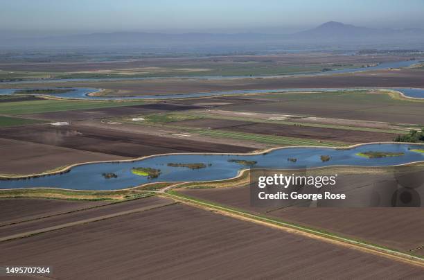 The Mokelumne River is viewed from the air on May 22 near Rio Vista, California. The SacramentoSan Joaquin River Delta, or California Delta, is an...