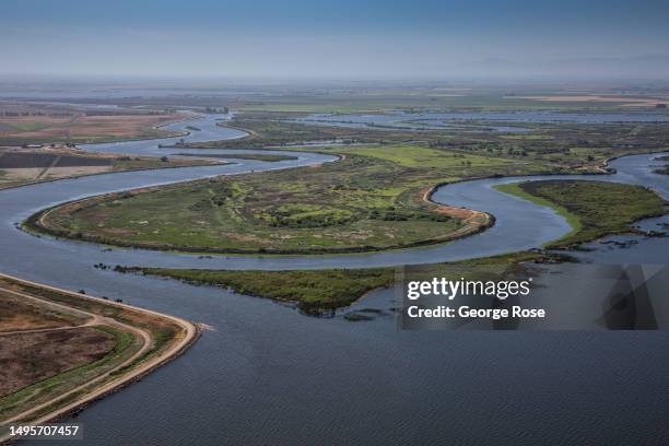 Flooded farmland and small islands, located near the confluence of the Sacramento and San Joaquin Rivers, is viewed from the air on May 22 near Rio...