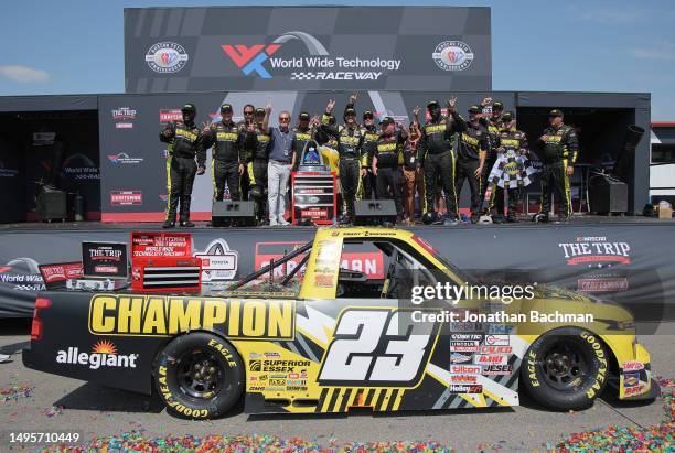 Grant Enfinger, driver of the Champion Power Equipment Chevrolet, and crew celebrate in victory lane after winning the NASCAR Craftsman Truck Series...