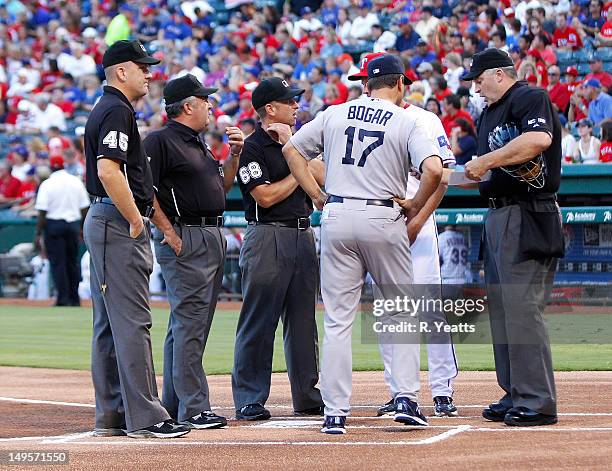 Jeff Nelson, Tim Tschida, Chris Guccione, Tim Bogar of the Boston Red Sox and home plate umpire Bill Welke prior to the start of the game against the...