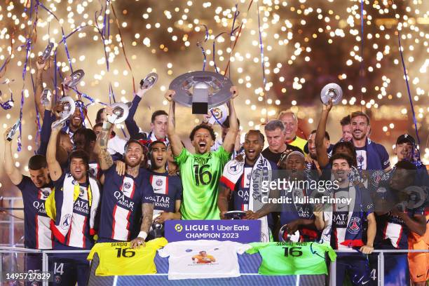 Marquinhos of Paris Saint-Germain lifts the Ligue 1 Uber Eats trophy during the Ligue 1 match between Paris Saint-Germain and Clermont Foot at Parc...