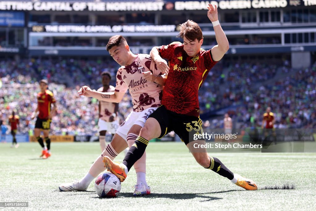 Codm Baker Claudio Bravo of Portland Timbers and Cody Baker of Seattle Sounders ...