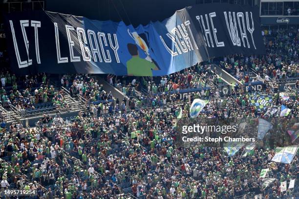 Seattle Sounders supporters cheer before the game against the Portland Timbers at Lumen Field on June 03, 2023 in Seattle, Washington.