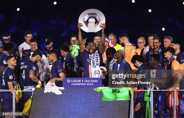 Renato Sanches of Paris Saint-Germain lifts the Ligue 1 Uber Eats trophy after the Ligue 1 match between Paris Saint-Germain and Clermont Foot at...