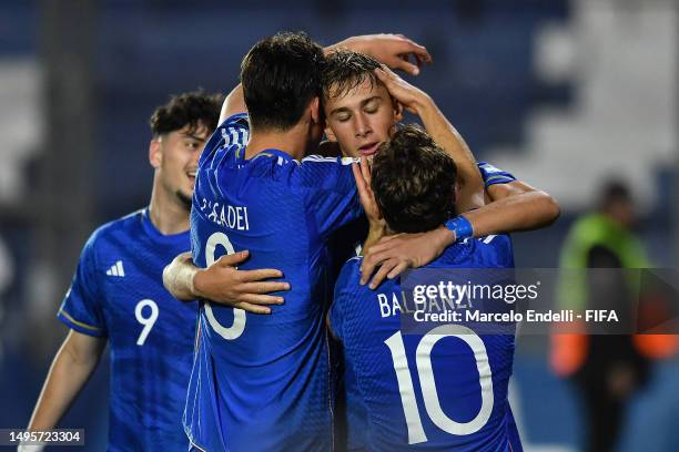 Francesco Esposito of Italy celebrates with his teammates after scoring the team's third goal during a FIFA U-20 World Cup Argentina 2023 Quarter...