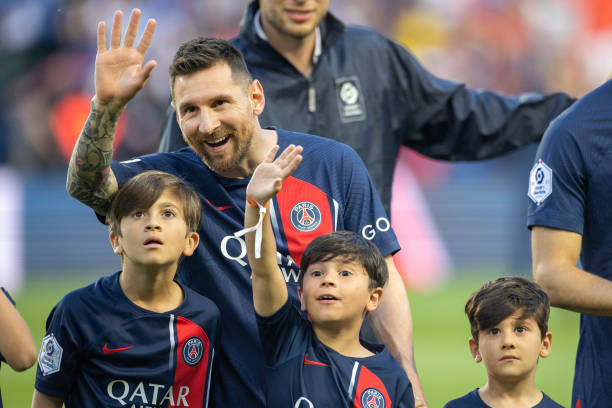 Lionel Messi of Paris Saint-Germain with his sons Thiago, Mateo and Ciro, as they try and spot his wife and the boys mother Antonela Roccuzzo in the...