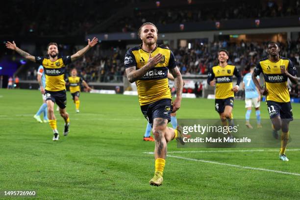 Jason Cummings of the Mariners celebrates scoring his second penalty goal during the 2023 A-League Men's Grand Final match between Melbourne City and...