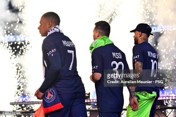Kylian Mbappe, Leo Messi and Neymar Jr of Paris Saint-Germain walkon the pitch before the France championship trophy ceremony after the Ligue 1 match...