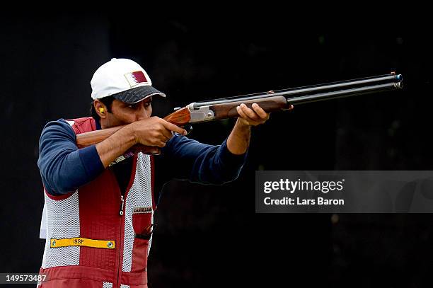 Nasser Al-Attiya of Qatar competes in the Men's Skeet Shooting final round on Day 4 of the London 2012 Olympic Games at The Royal Artillery Barracks...