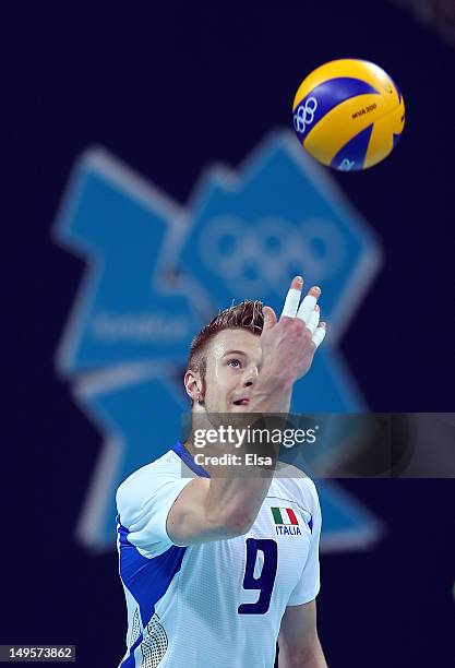 Ivan Zaytsev of Italy serves the ball in the second set against Argentina during Men's Volleyball on Day 4 of the London 2012 Olympic Games at Earls...