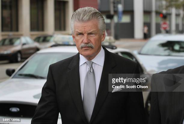 Will County State's Attorney James Glasgow arrives at the Will County Courthouse for opening arguments in the trial of Drew Peterson July 31, 2012 in...