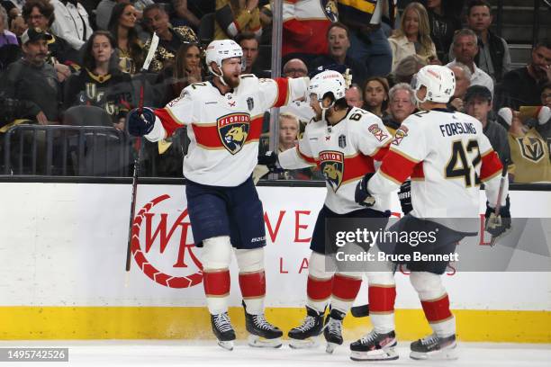 Eric Staal of the Florida Panthers is congratulated by his teammates after scoring a goal against the Vegas Golden Knights during the first period in...