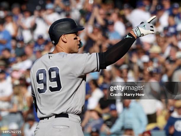 Aaron Judge of the New York Yankees celebrates his solo homerun to take a 5-1 lead over the Los Angeles Dodgers during the sixth inning at Dodger...