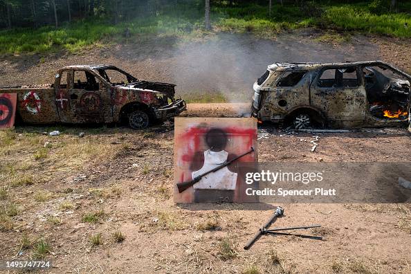 Targets sit riddled with bullets holes at the annual Machine Gun ...