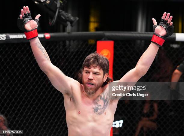 Jim Miller reacts after his knockout victory over Jesse Butler in a lightweight bout during the UFC Fight Night event at UFC APEX on June 03, 2023 in...