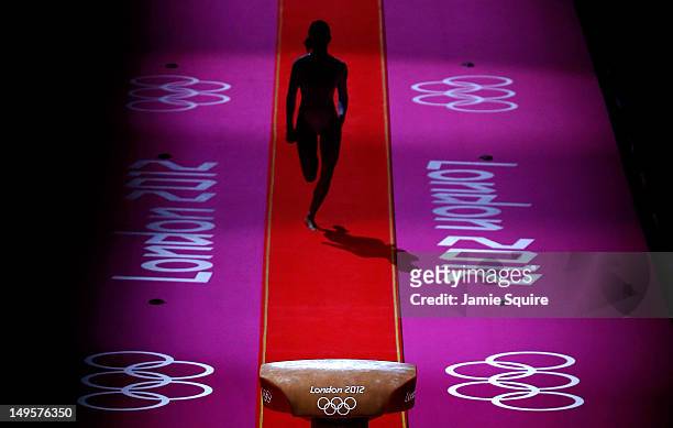 Gymnast performs during warmups before the start of the Artistic Gymnastics Women's Team final on Day 4 of the London 2012 Olympic Games at North...