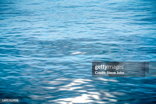 sea and wave in sunrise - water surface stock pictures, royalty-free photos & images