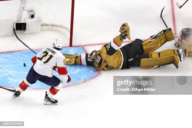 Adin Hill of the Vegas Golden Knights makes a stick save against Nick Cousins of the Florida Panthers during the second period in Game One of the...