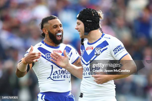 Josh Addo-Carr of the Bulldogs and Matt Burton of the Bulldogs react during the round 14 NRL match between Sydney Roosters and Canterbury Bulldogs at...