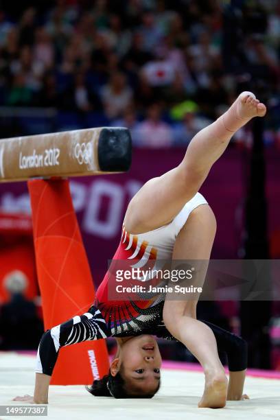 Yu Minobe of Japan lands on her head during the dismount on the balance beam in the Artistic Gymnastics Women's Team final on Day 4 of the London...