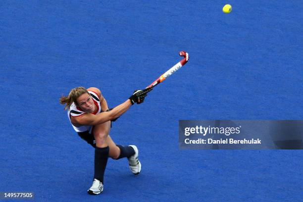 Crista Cullen of Great Britain clears the ball during the Women's Hockey Match between Great Britain and Korea on day 4 of the London 2012 Olympic...