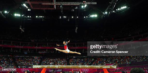 Asuka Teramoto of Japan competes on the balance beam in the Artistic Gymnastics Women's Team final on Day 4 of the London 2012 Olympic Games at North...