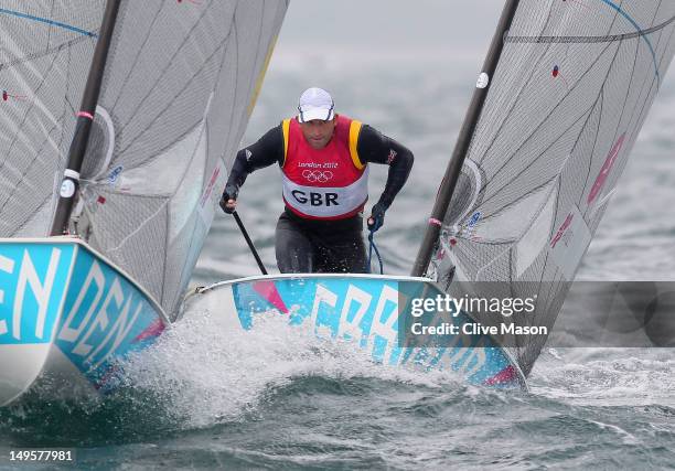 Ben Ainslie of Great Britain competes in the Men's Finn Sailing on Day 4 of the London 2012 Olympic Games at Weymouth Harbour on July 31, 2012 in...