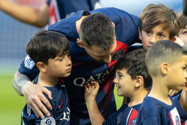 Lionel Messi of Paris Saint-Germain with his sons Thiago, Mateo, and Ciro, after the player's children accompanied them for pre-match presentations...