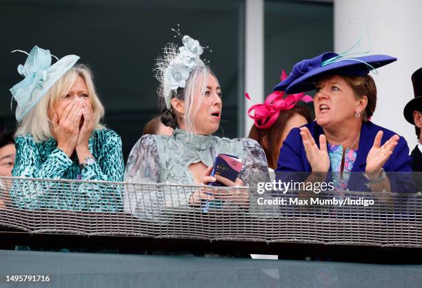 Sue Barker, Alex Truesdale and Clare Balding watch the racing as they attend 'Derby Day' of The Derby Festival 2023 at Epsom Downs Racecourse on June...