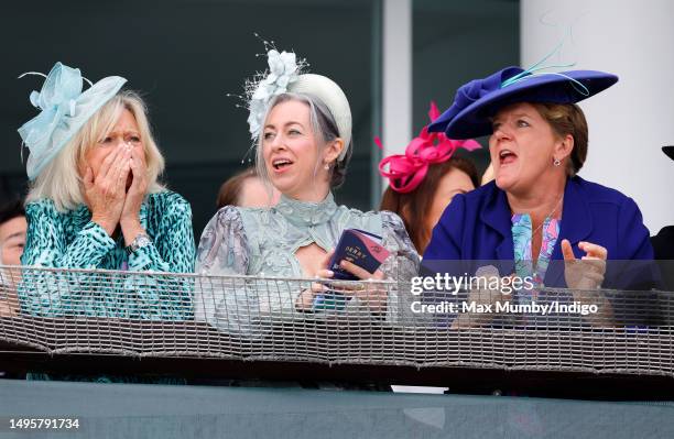 Sue Barker, Alex Truesdale and Clare Balding watch the racing as they attend 'Derby Day' of The Derby Festival 2023 at Epsom Downs Racecourse on June...