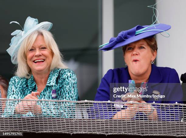 Sue Barker and Clare Balding watch the racing as they attend 'Derby Day' of The Derby Festival 2023 at Epsom Downs Racecourse on June 3, 2023 in...