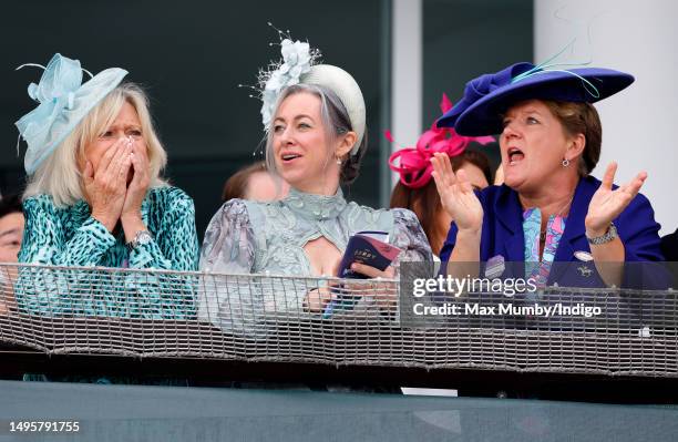 Sue Barker, Alex Truesdale and Clare Balding watch the racing as they attend 'Derby Day' of The Derby Festival 2023 at Epsom Downs Racecourse on June...