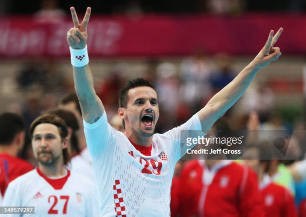 Ivan Nincevic of Croatia celebrates victory after the Men's Handball Preliminary match between Serbia and Croatia on Day 4 of the London 2012 Olympic...