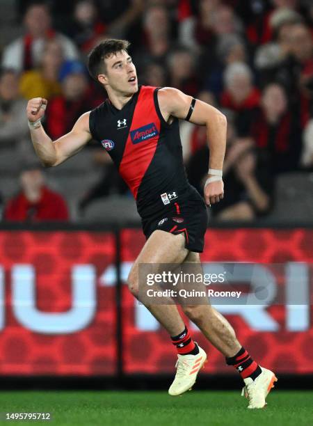 Zach Merrett of the Bombers celebrates kicking a goal during the round 12 AFL match between Essendon Bombers and North Melbourne Kangaroos at Marvel...