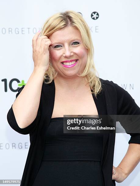 Cupcakes" Sophie LaMontagne celebrates Crocs Tenth anniversary by ringing the NASDAQ opening bell at the NASDAQ MarketSite on July 31, 2012 in New...