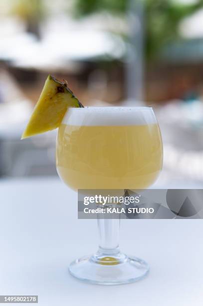 Refreshing Pineapple Drink On An Outdoor Terrace Pina Colada High-Res Stock Photo