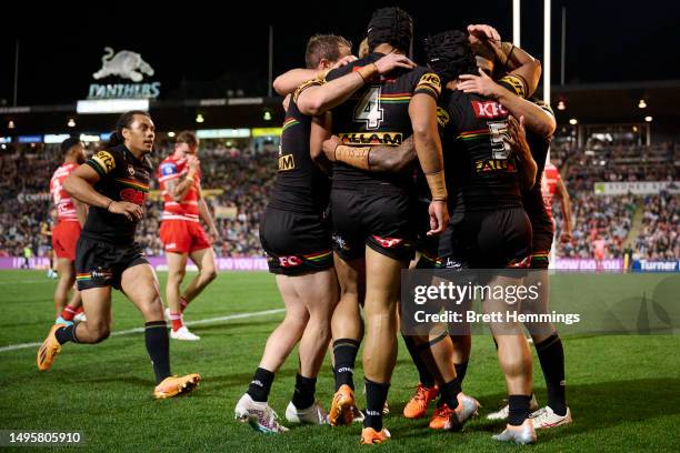 Brian To'o of the Panthers celebrates scoring a try with team mates during the round 14 NRL match between Penrith Panthers and St George Illawarra...