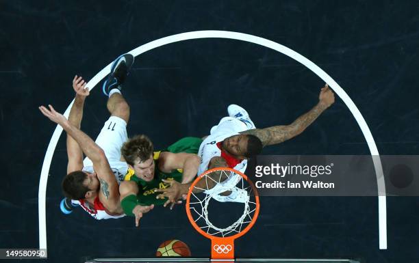 Tiago Splitter of Brazil drives to the basket in the Men's Basketball Preliminary Round match between Great Britain and Brazil on Day 4 of the London...