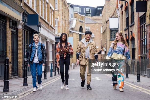 diverse group exploring london’s east end - east london stock pictures, royalty-free photos & images