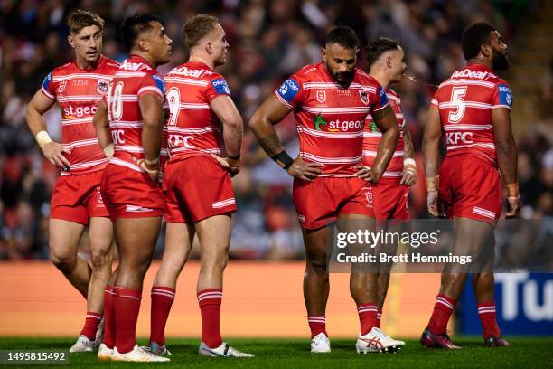 Dragons players look dejected after a Panthers try during the round 14 NRL match between Penrith Panthers and St George Illawarra Dragons at BlueBet...