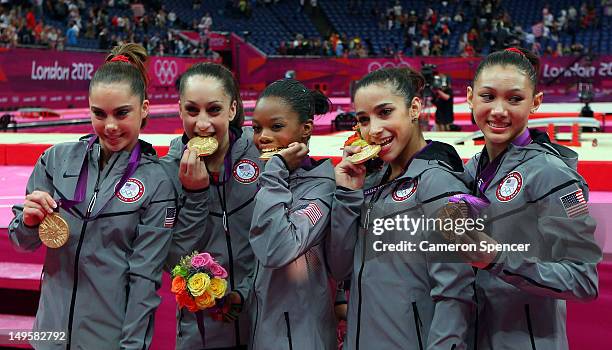 Mc Kayla Maroney, Jordyn Wieber, Gabrielle Douglas, Alexandra Raisman and Kyla Ross of the United States celebrate after winning the gold medal in...