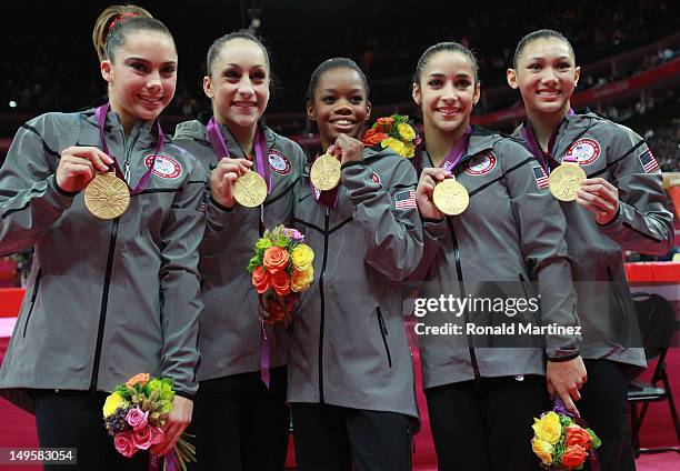 Mc Kayla Maroney, Jordyn Wieber, Gabrielle Douglas, Alexandra Raisman and Kyla Ross of the United States celebrate after winning the gold medal in...