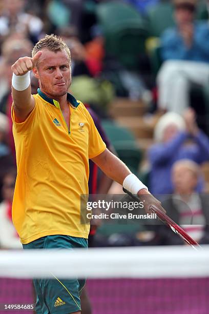 Lleyton Hewitt of Australia celebrates defeating Marin Cilic of Croatia in the second round of Men's Singles Tennis on Day 4 of the London 2012...