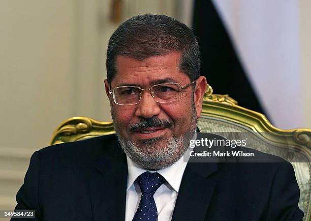 Egyptian President Mohamed Morsi participates in a meeting U.S. Secretary of Defense Leon Panetta, at the Presidential Palace on July 31, 2012 in...